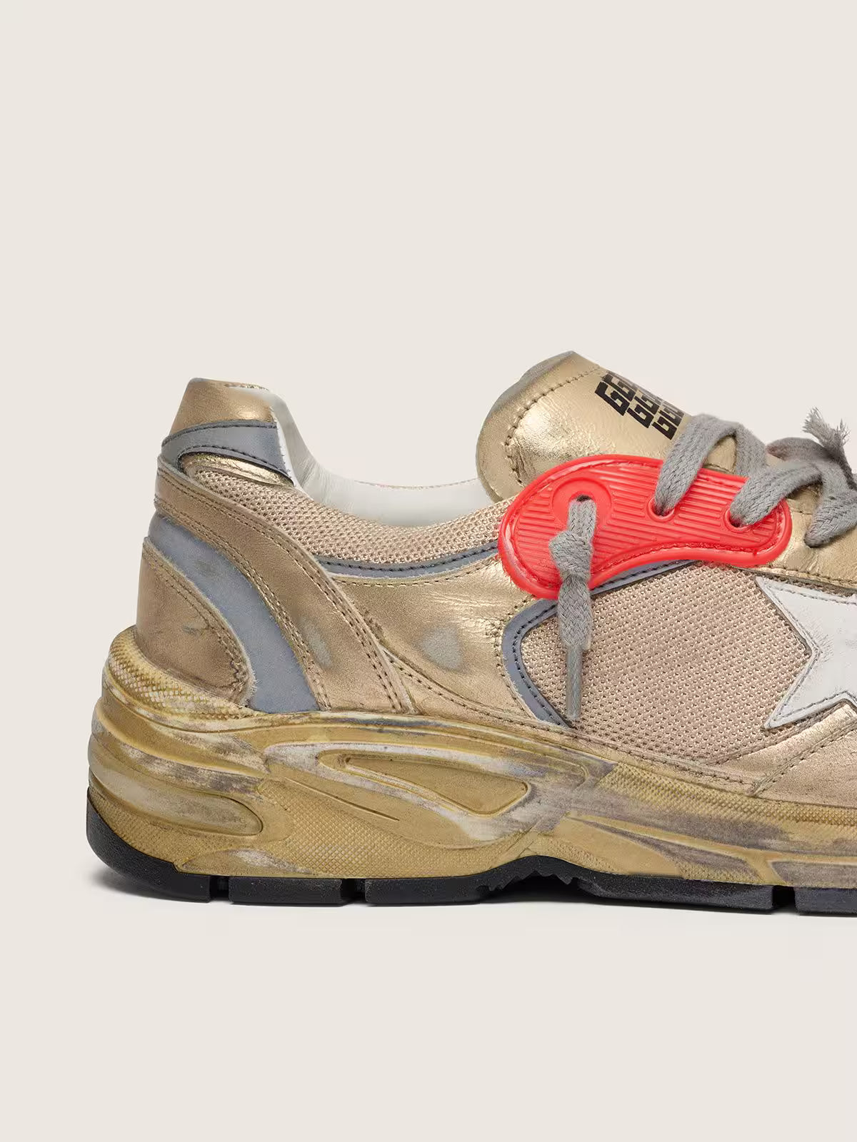 Dad-Star pour femme en cuir lamé doré et résille avec étoile en cuir blanc et contrefort en cuir doré