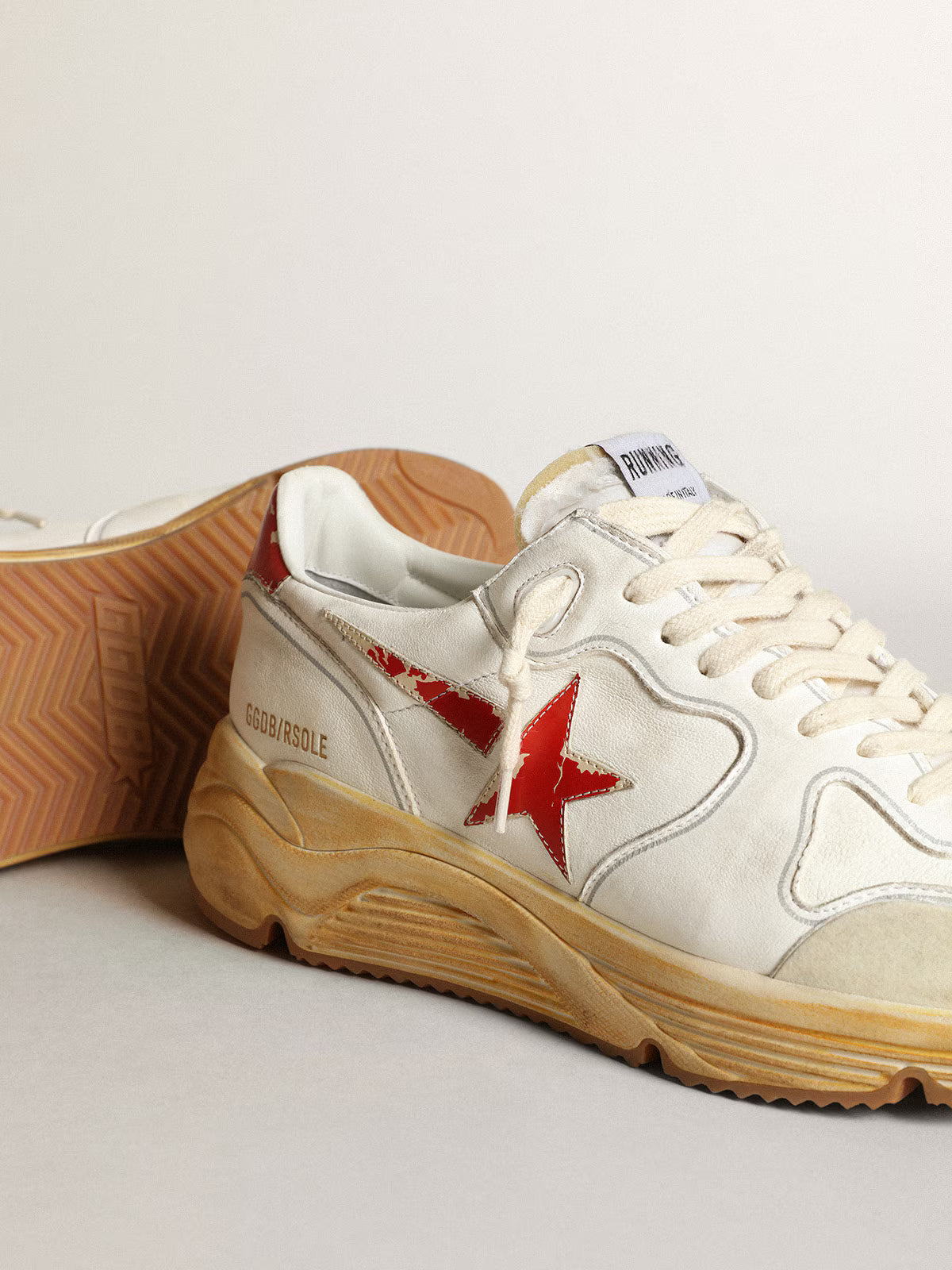 Running Sole homme avec étoile et contrefort en cuir à imprimé rouge