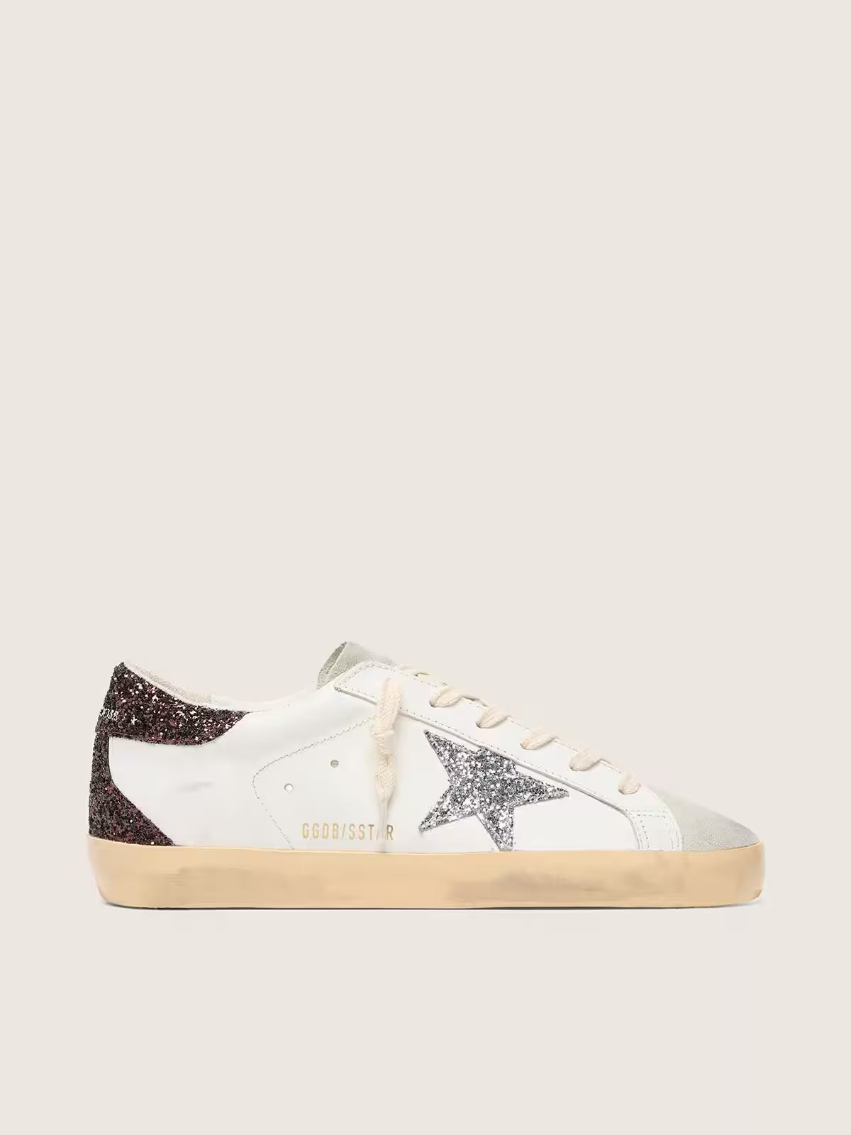 Super-Star avec étoile argentée et contrefort à paillettes marron